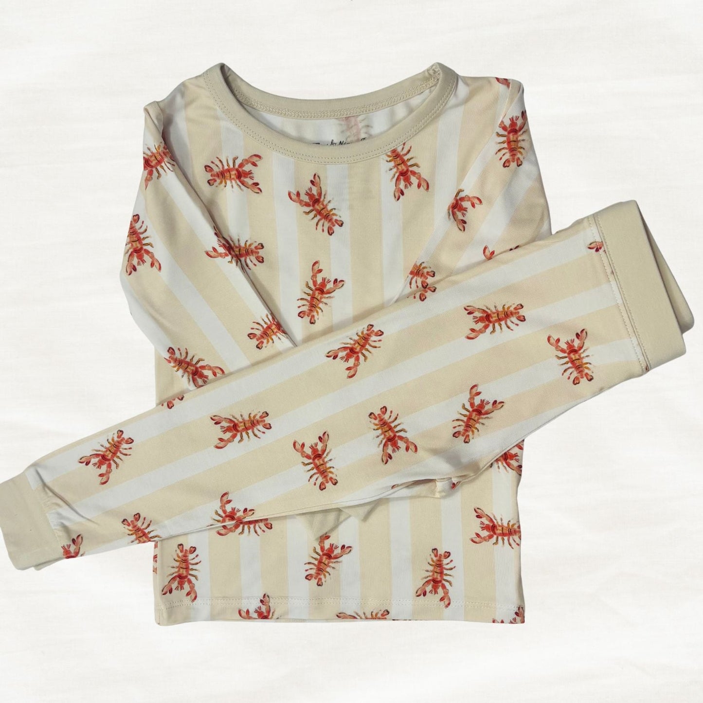 Children's pajama set with red lobster stripe print