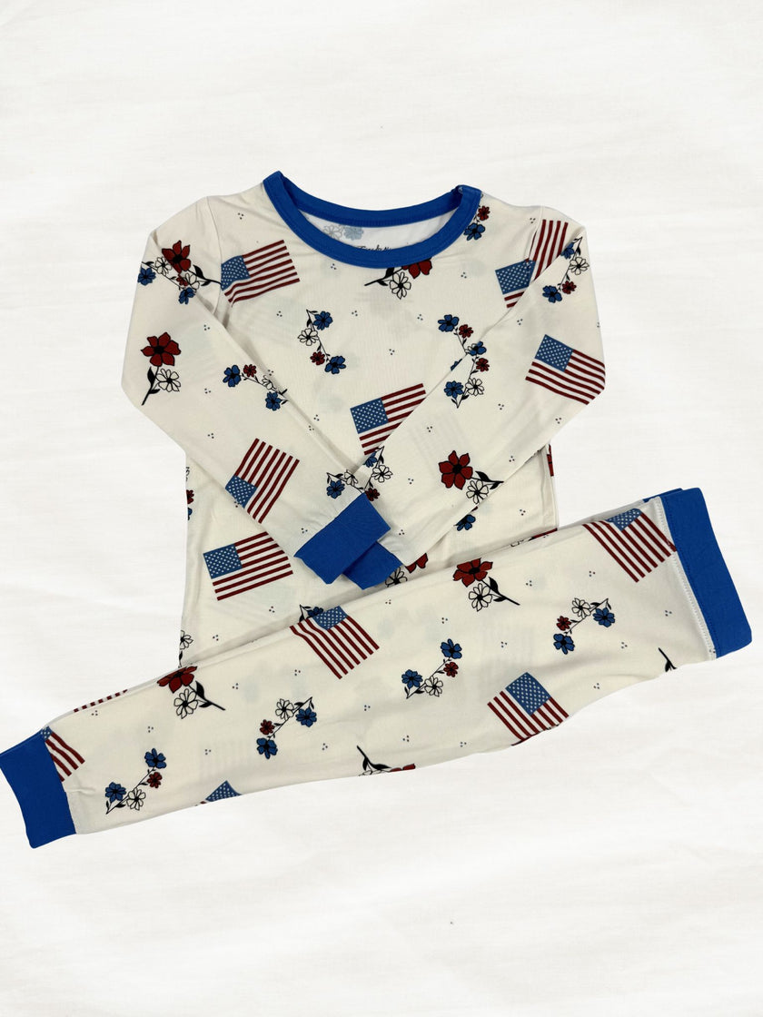 Children's pajama set with American flag design on a white background